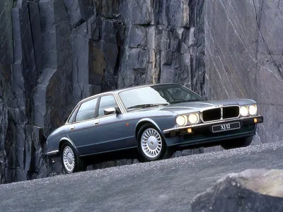 Car, Jaguar XJ R, Limousine, Luxury approx.s, model year 2003-, black,  driving, country road, diagonal from the front, Front vie Stock Photo -  Alamy