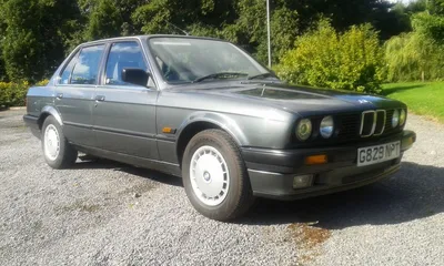 BMW E30 M3 1980s super saloon in Dolphin Grey Stock Photo - Alamy