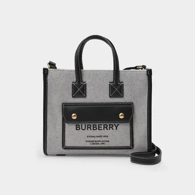 BURBERRY Leather-trimmed checked canvas shoulder bag | NET-A-PORTER