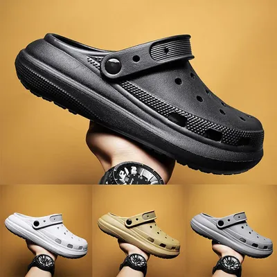 Special edition Crocs shoes in collaboration with DJ Diplo, light up and  glow in the dark Stock Photo - Alamy