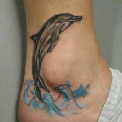 Dolphin Bro | Dolphin foot tattoo. | Brandon Smith | Flickr