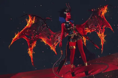 Фото Девушка в костюме демона с горящими крыльями