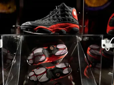 Michael Jordan's game-worn sneakers sell for a record $615,000 | CNN