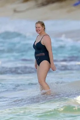 https://www.hellomagazine.com/celebrities/20221220160037/amy-schumer-cheeky-tease-swimsuit-beach-photo-husband/