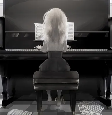 Фото Девушка играет на фортепиано