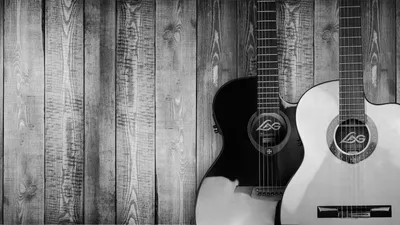 Две акустические гитары с оттенками серого · Бесплатные стоковые фото