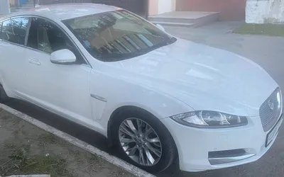 Аренда автомобиля Jaguar XJ Long (Ягуар) белого цвета.