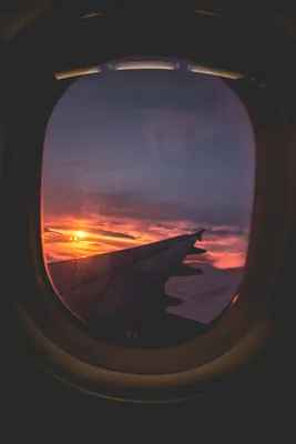 Фото Закат солнца из окна самолета