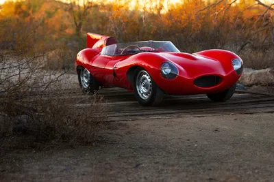 Red jaguar z-type compact electric hot hatch on Craiyon