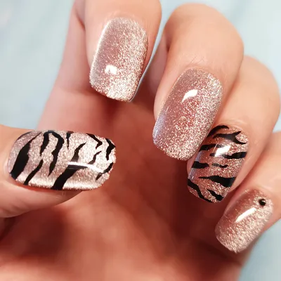 Tiger Nails · A Tiger Print Nail Manicure · Nail Painting on Cut Out + Keep