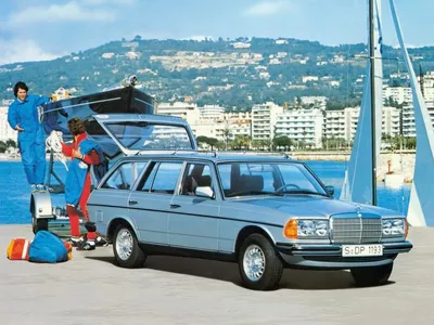 A mercedes benz w123 with lowered suspesion and a widebody kit on Craiyon