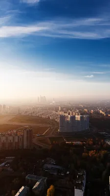Обои Москва, город, вид сверху, фабрика, дым, здания, утро, солнце 750x1334  iPhone 8/7/6/6S Изображение