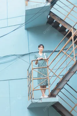 Woman in a long dress lying on the stairs Stock Photo by ©artfotoss 11016364