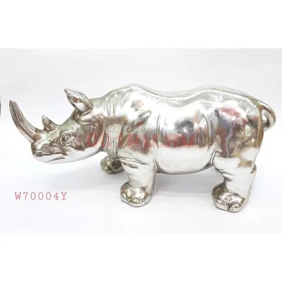 Статуэтка носорог (W70004Y) полистоун серебро купить оптом за 606,50 руб. в  Москве с доставкой по России. Фото, цены, характеристики!