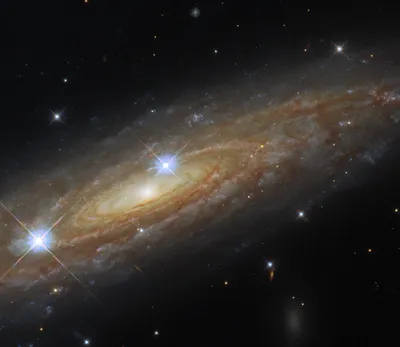 Фото дня: на краю спиральной галактики в созвездии Орла