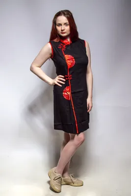 Красивая китаянка в платье ципао 20…» — создано в Шедевруме