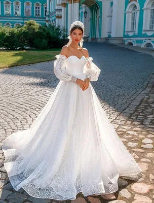 Блестящее свадебное платье с пышными рукавами купить в Москве