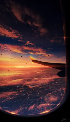Фото Вид на закатное небо из окна самолета