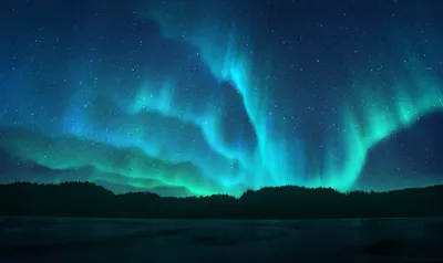 Фото На ночном небе северное сияние