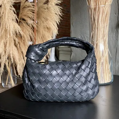 Bottega Veneta® Women's Small Loop Camera Bag in Black. Shop online now.