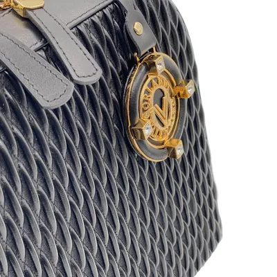 Valentino Garavani's Locò bag is your latest '90s-inspired style staple