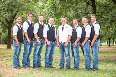 country formal groomsmen in vests, jeans and boots | Rustic groomsmen  attire, Country wedding groomsmen, Country chic wedding