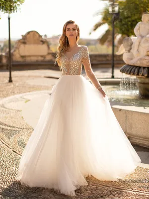 Блестящее свадебное платье с рукавами и стразами Essential Tiva 32461 |  Купить свадебное платье в салоне Валенсия (Москва)