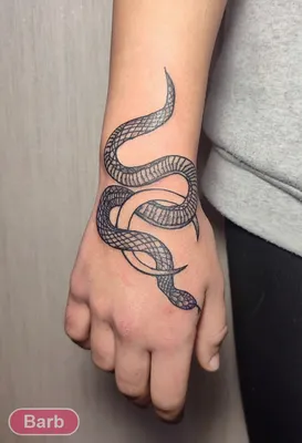 Эскиз тату змея на дереве - фото в салоне Tattoo Times