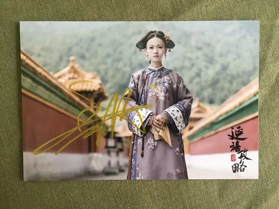 Актер Сюй Кай и актриса У Цзиньян позируют на красной дорожке 2019 года... Реальное фото — Getty Images