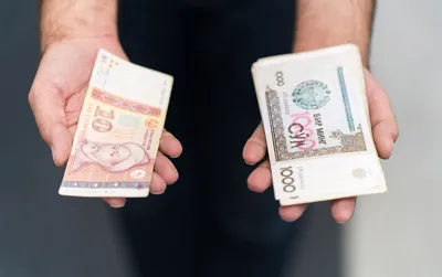 Почему узбекский сум растет к доллару, а таджикский сомони падает